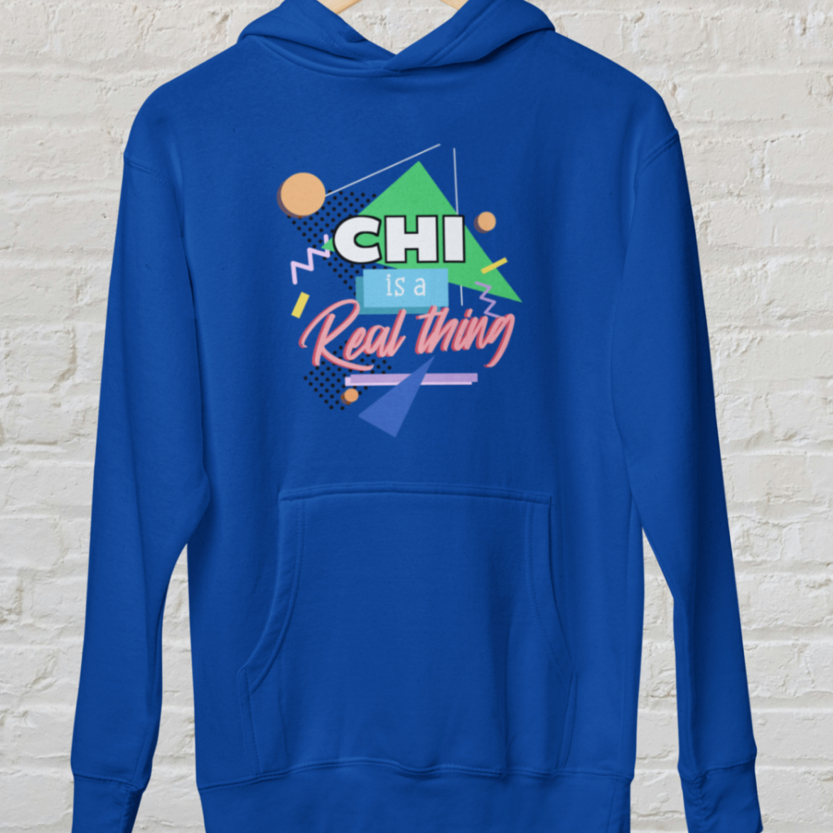 Hoodie royal blue 'Chi is a real thing' design white brick backround